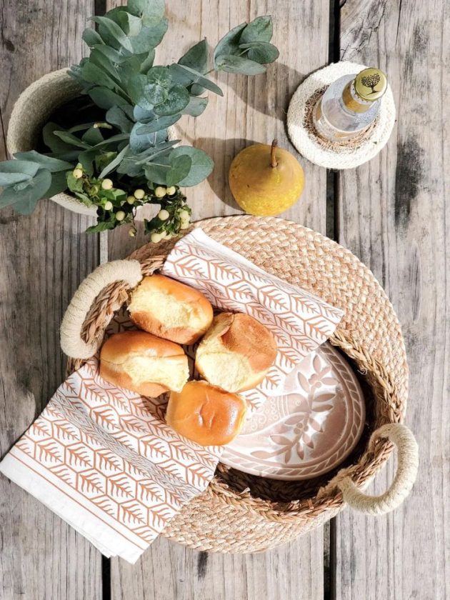Bread placed inside artisanal bread warmer basket available on made trade