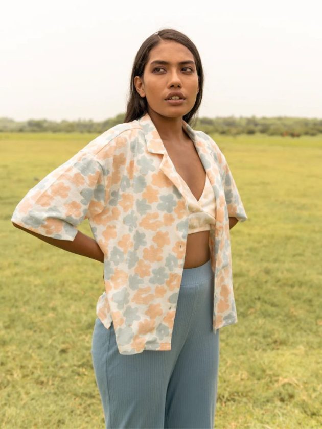 Colorful floral blouse from sustainable fashion marketplace Earthkind