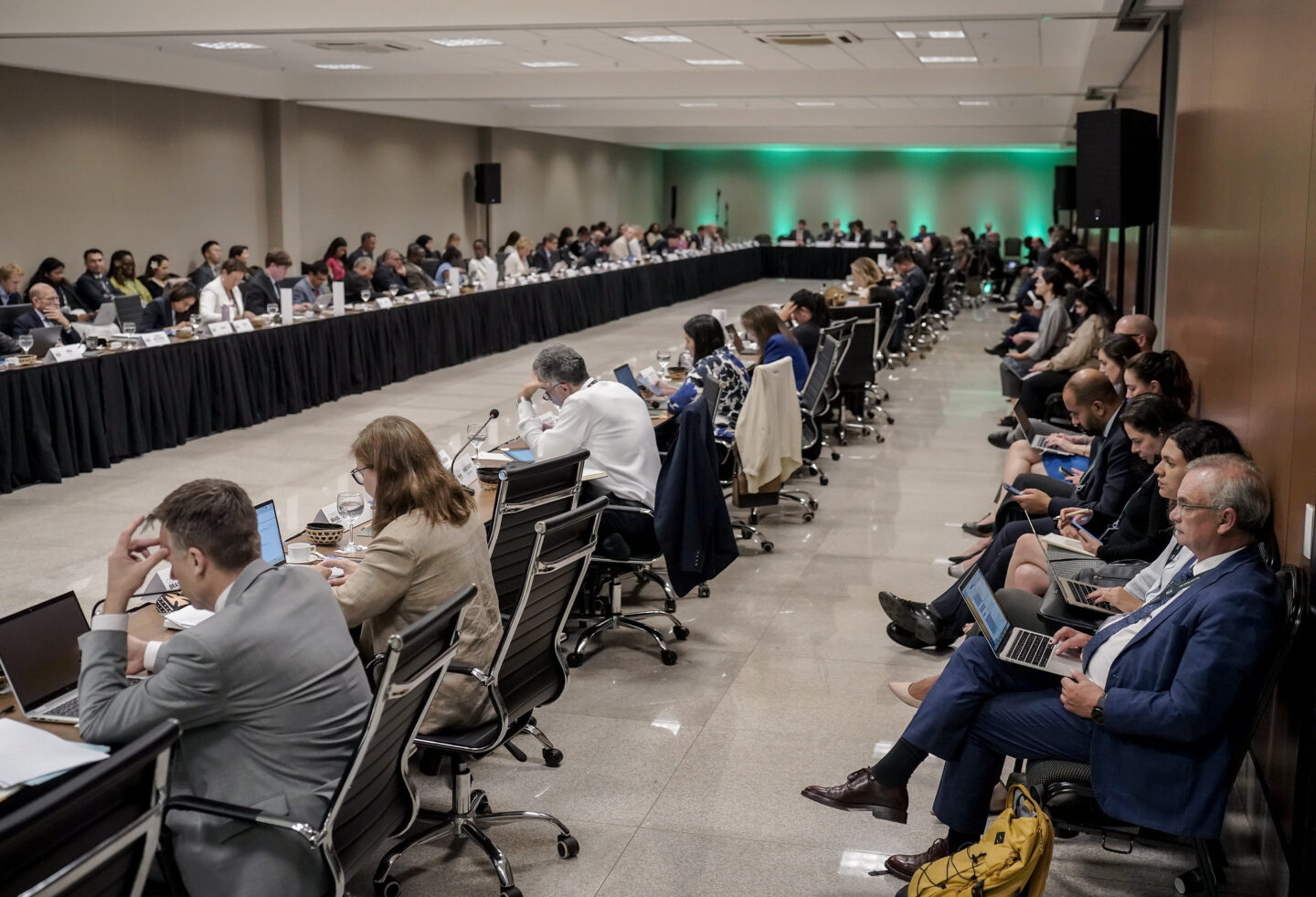 A room full of country delegates sitting around a long table during Ministerial consultations held on October 15, 2025, during pre-COP30 in Brasilia. 