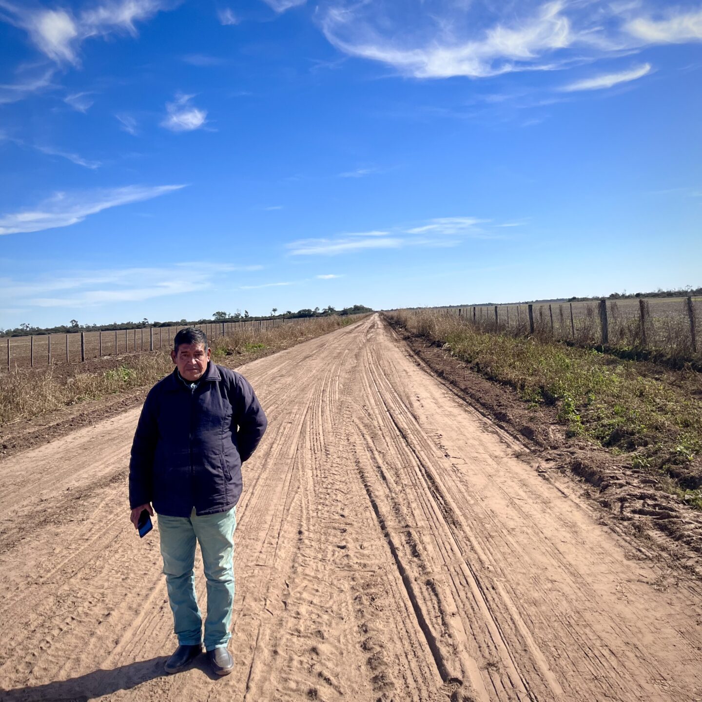 Oscar Villalba, in between two deforested plots of land outside of Tres Isletas, Chaco, Argentina.