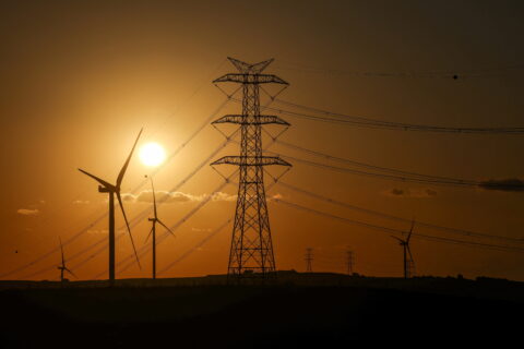 The sun sets behind wind turbines in Silivri near Istanbul, Turkey.