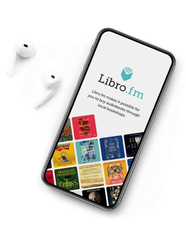 phone and head phones with audiobooks from libro.fm app on screen