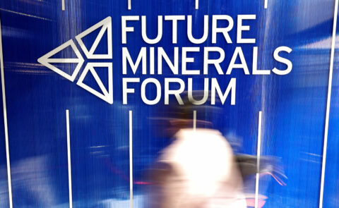 Future Minerals Forum is written in white on blue background