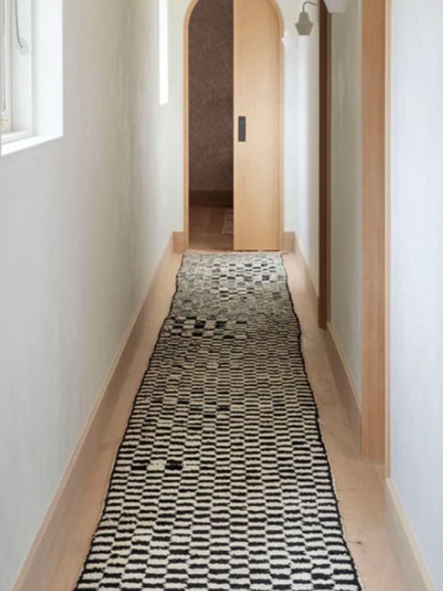 Black and white sustainable hallway rug