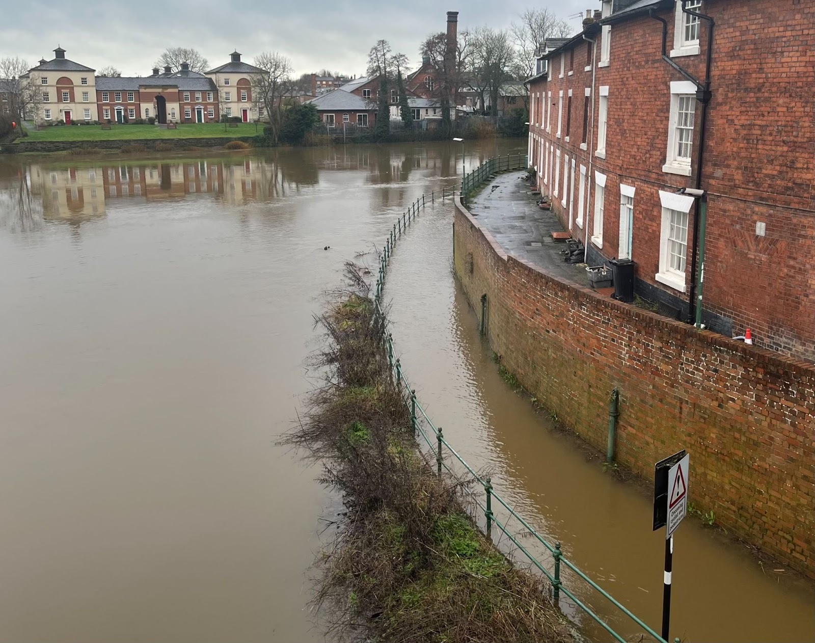 Burst river bank of the river Severn in Shrewsbury, Shropshire.