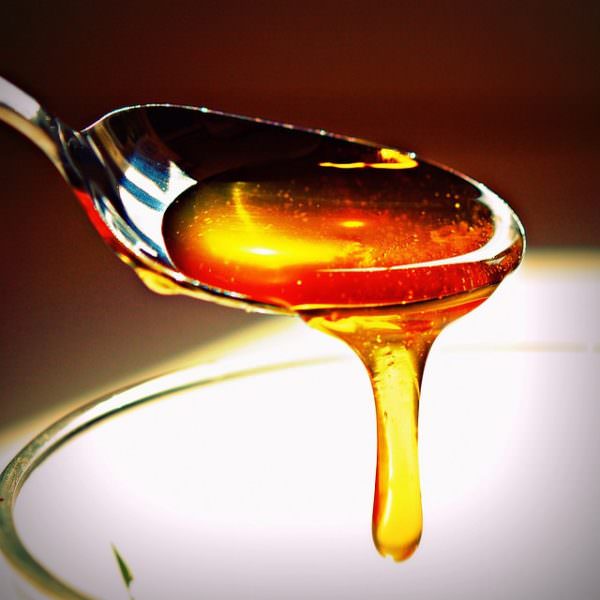 Sweet honey on the spoon