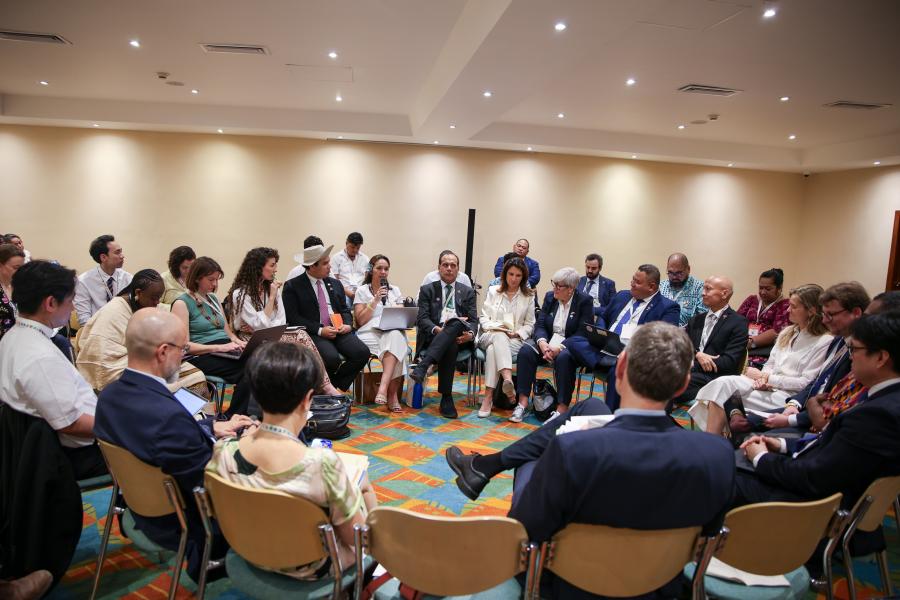 Country representatives, including Panama’s special representative on climate change, Juan Carlos Monterrey Gómez; the climate envoy for the Marshall Islands, Tina Stege; COP30 CEO, Ana Toni; UK special representative on climate, Rachel Kyte; and Tuvalu climate minister, Dr Maina Talia, participating in a closed-door breakout session. Credit: Earth Negotiations Bulletin