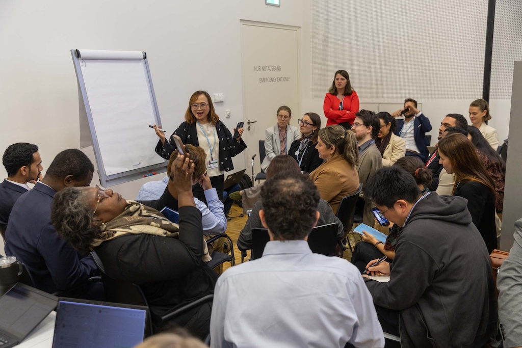 Delegates break out into groups for more in-depth discussions.