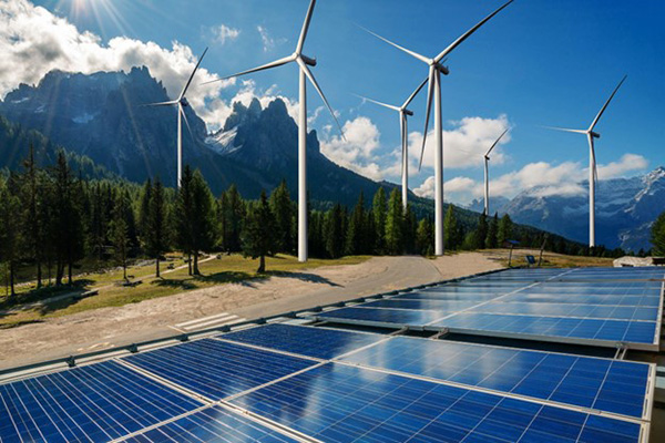 Overconsumption of Natural Resources: Causes, Effects & Solutions (2026) 5 Renewable Examples Windmills and Solar Panels