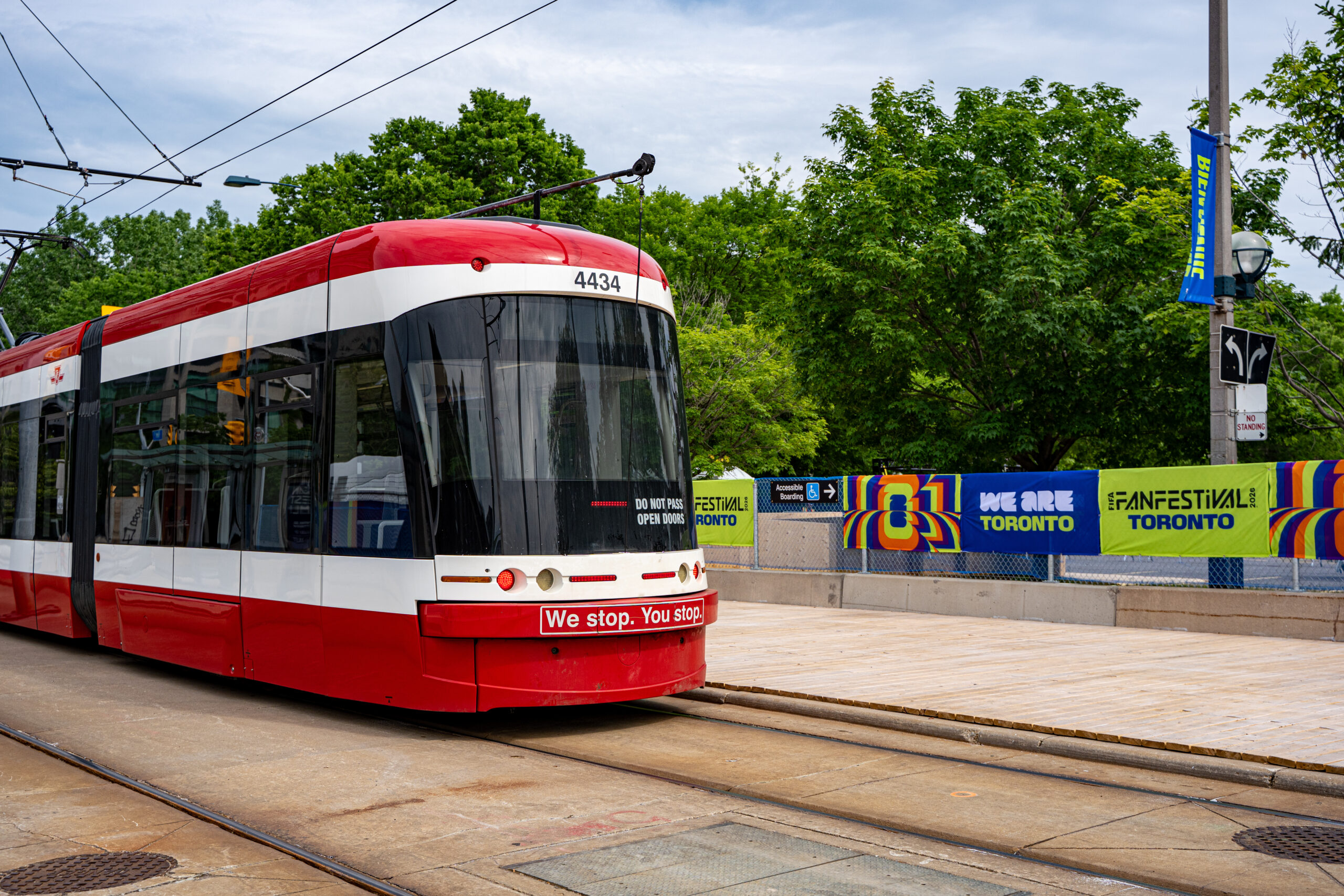 Toronto streetcar passing FIFA Fan Festival 2026 venue area. Toronto, Canada - June 9, 2026.