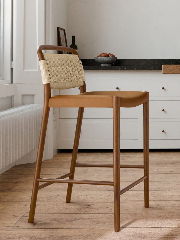 Walnut mid century modern stool made with sustainably sourced wood with woven fabric back