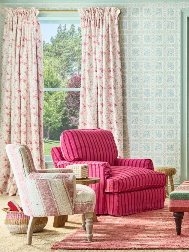 Linen armchair with pink stripes next to bright pink and red striped vintage style armchair with slipcover