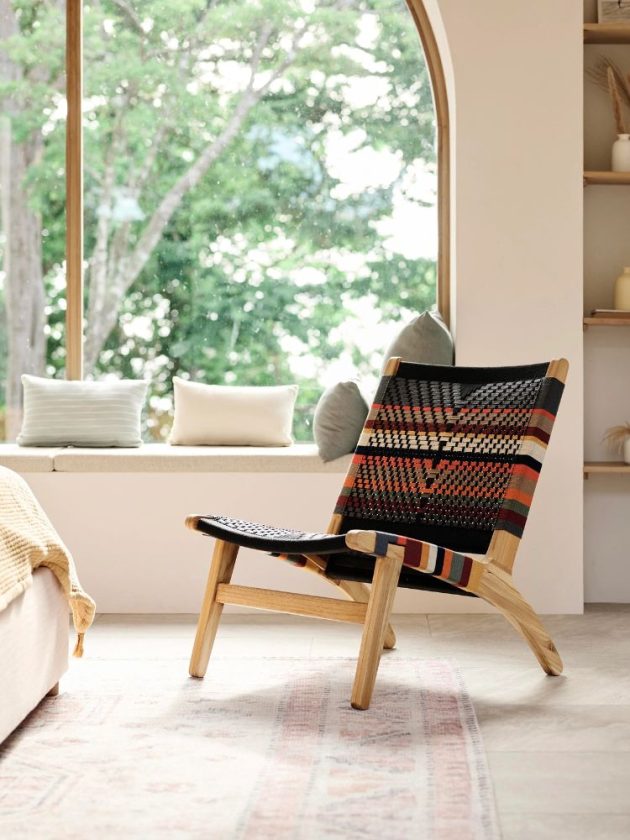 Lounge chair in natural wood and striped pattern