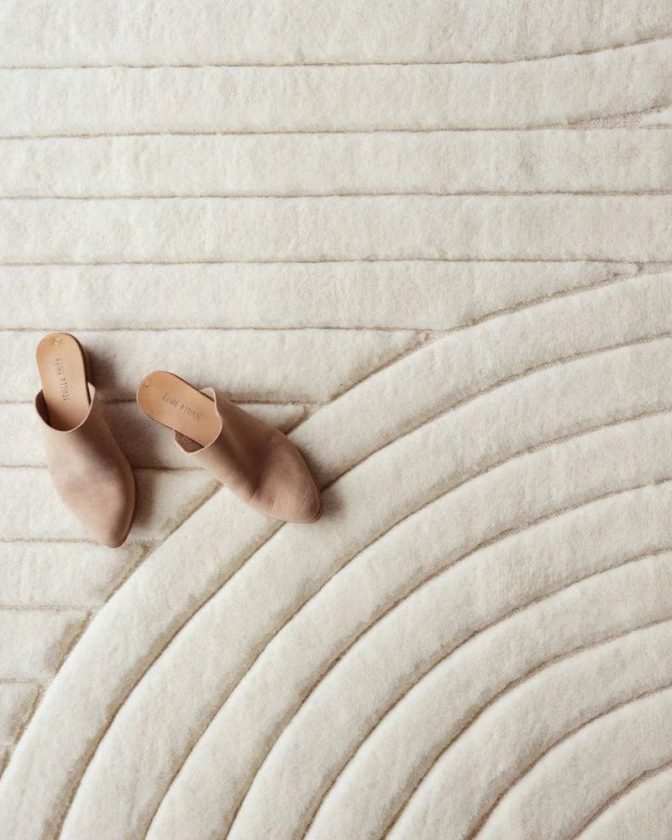 Beige hand-knotted fair trade rug