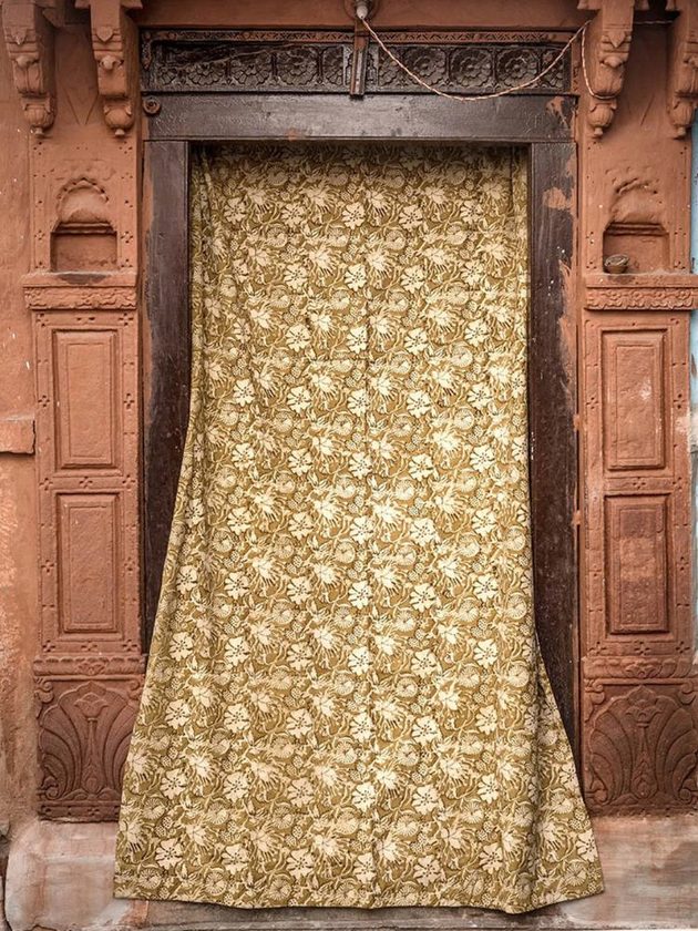 Yellow naturally dyed cotton curtain hand blockprinted by artisans