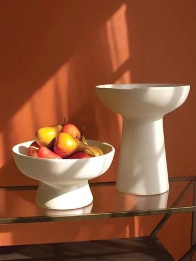 White fruit bowl and decorative object